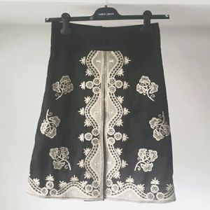 Le Chateau skirt. Opens at the front. Lining inside.Beautiful work of embroidery